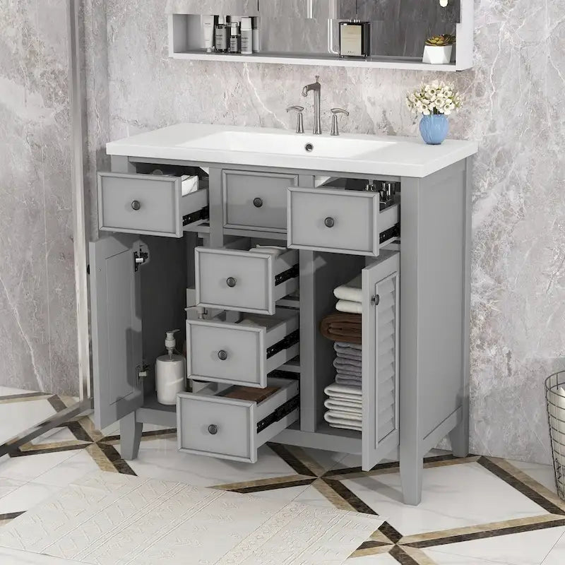 Mueble de baño con lavabo cerámico, dos armarios y cinco cajones